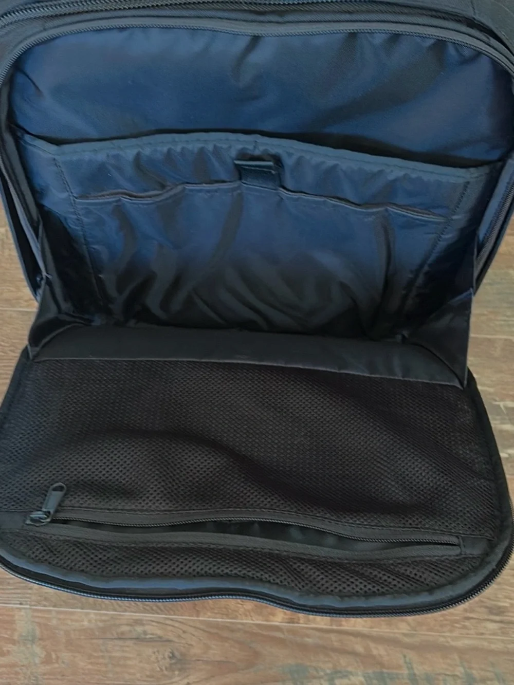 The North Face Black Rolling Carry-On with Red Handle